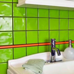 Wholesale 🎁 Merola Tile Twist Orange Sunset .5" X 11.75" Cana Cigarro Ceramic Wall Trim Tile - (1 Tile) 👏